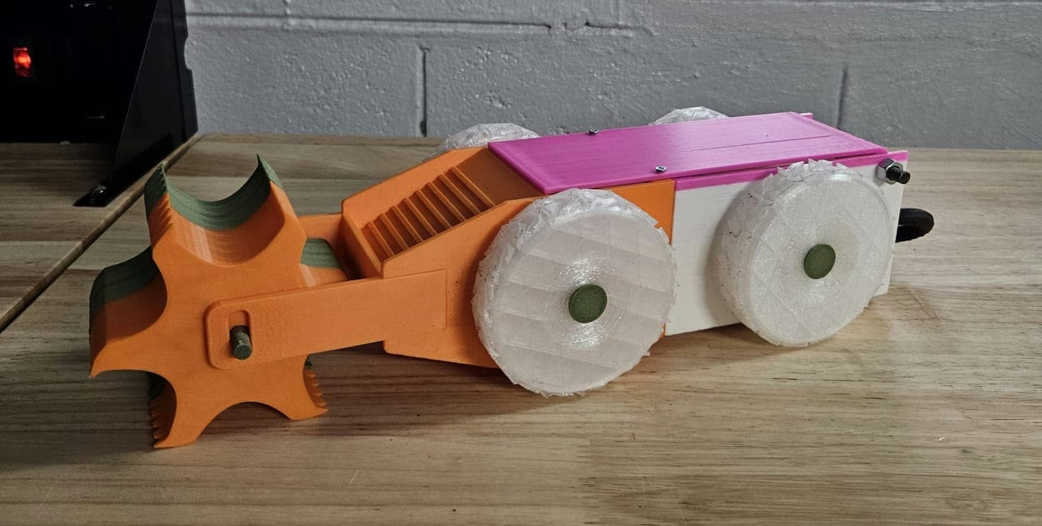 The 2025–2026 soil-analysis rover prototype assembled on a workbench