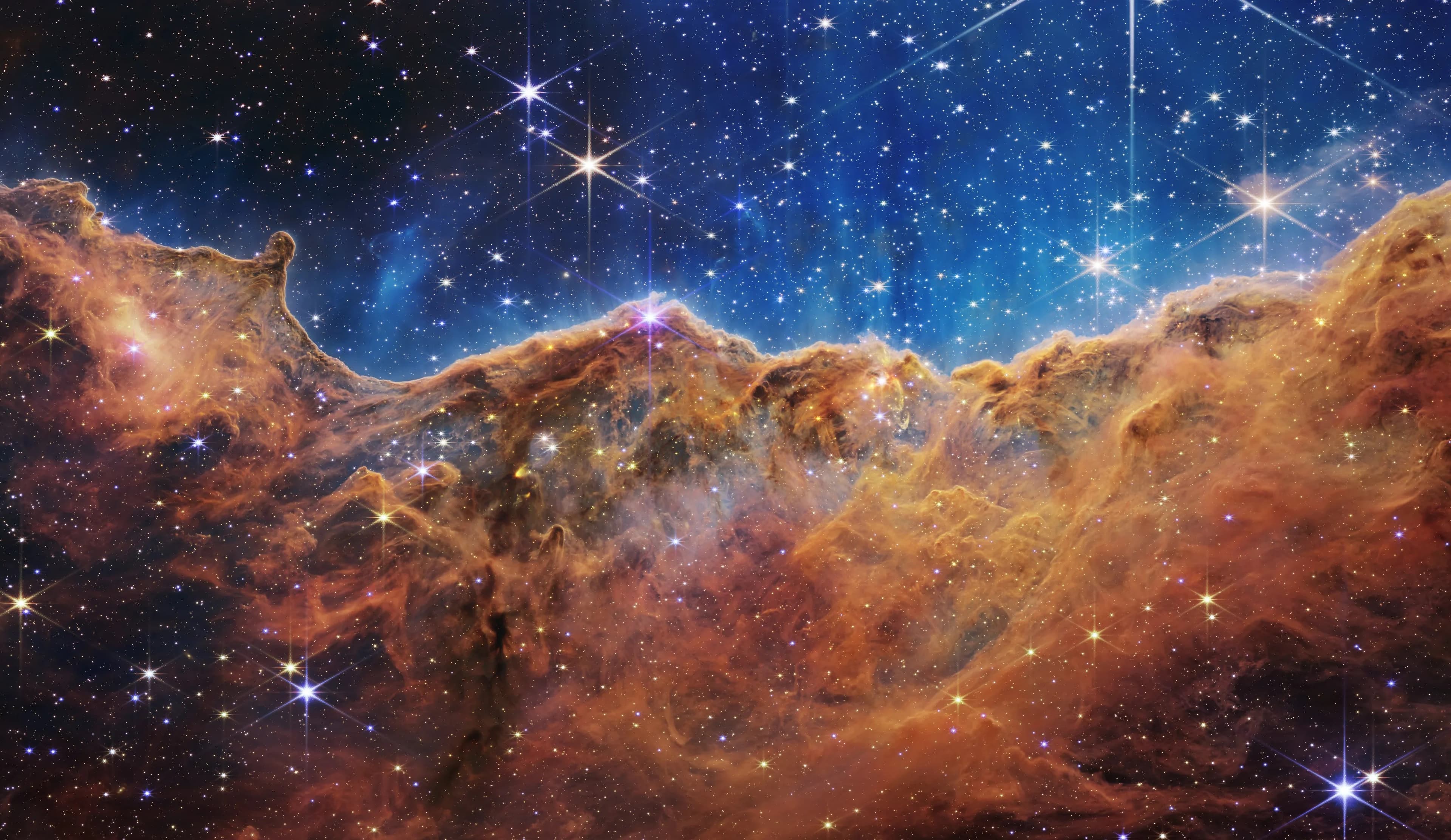 The Cosmic Cliffs of the Carina Nebula, captured by the James Webb Space Telescope